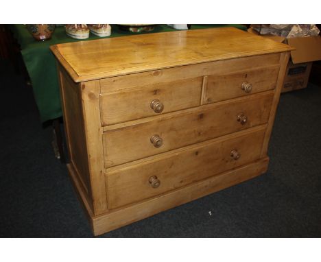 A pine chest of two short over two long drawers, on bracket base, 104cm