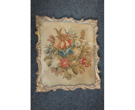 A giltwood and gesso framed floral tapestry panel within a scroll frame (a/f), 51cm, (NC)