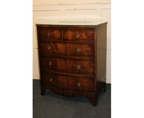 A mahogany bow front chest  of two short over three long drawers, on splayed bracket feet, 76cm