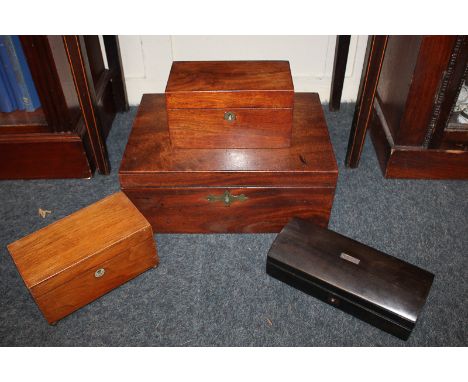 A 19th century oak writing slope, with secret drawer and pounce pot, together with a plain oak tea caddy, an ebonised box and