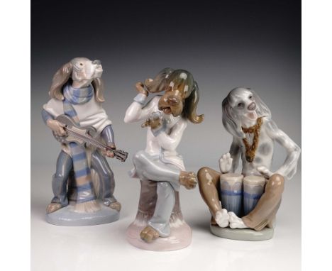 Charming 3-piece set by Lladro featuring anthropomorphic dog musicians: a guitarist with scarf 1001152, a seated singer with 