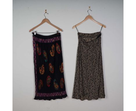 This lot includes two distinct pieces from renowned Italian and French fashion houses. The first is a skirt by Luciano Sopran