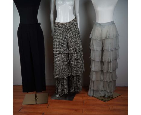 This elegant set of three Italian-made designer pieces includes black pinstripe trousers by Max Mara, layered black-and-white