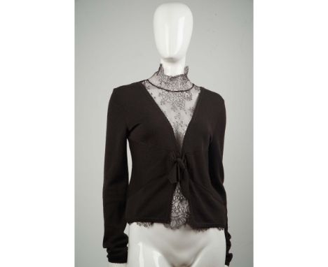 Indulge in luxury with this Valentino Boutique dark brown wool knit top featuring a delicate floral lace neckline and trim th