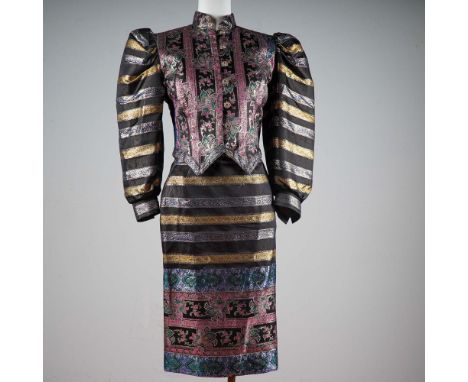 Step into a world of opulent design with this extraordinary ensemble by Zandra Rhodes, London. Handmade in England, this exqu