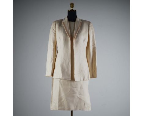 This sophisticated skirt suit by Valentino Miss V is crafted in a creamy linen fabric and features a tailored long-sleeve jac