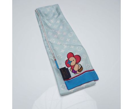 Louis Vuitton designer silk bandeau scarf featuring the iconic Vivienne character against a pastel blue Monogram background o