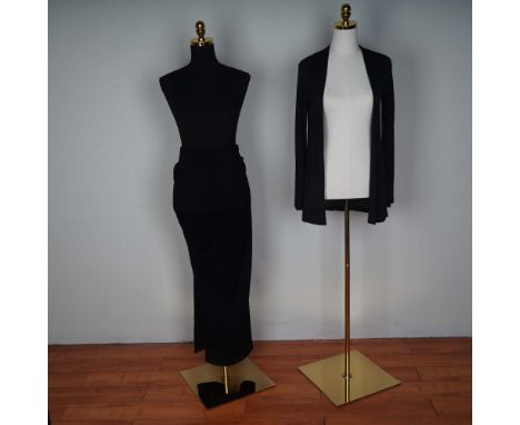 Elegant and timeless, this 2-piece black ensemble from Lesley Sandra of Sheffield features a classic knit design ideal for ve