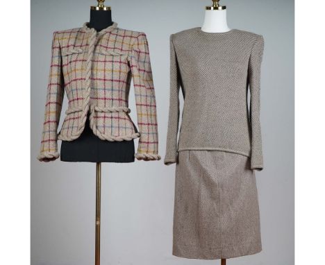 Step into timeless elegance with this two-piece wool skirt suit by Valentino Boutique, a luxury label synonymous with classic