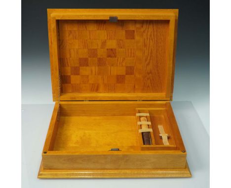 Beautifully handcrafted wooden game box featuring a checkerboard inlay on the lid and an integrated cribbage board along the 