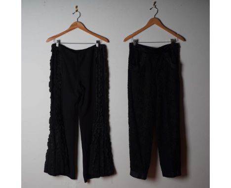 This striking pair of Yves Saint Laurent Rive Gauche trousers showcases the brand's celebrated sophistication and Parisian fl