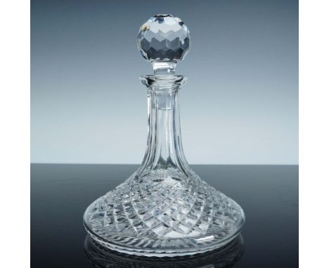 This elegant Waterford crystal wine decanter features the brand's iconic diamond-cut pattern, extending gracefully across its