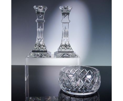 This elegant 3-piece set features two Waterford faceted candlestick holders with square bases and vertical fluting, paired wi