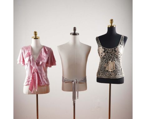 Offered in this lot is a refined 3-piece ensemble from the legendary Valentino label, capturing the brand's elegant aesthetic