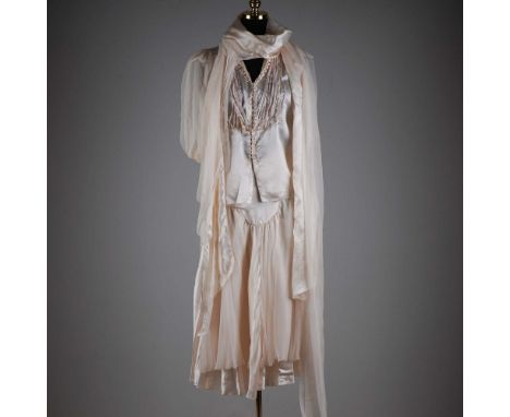 A flowing and romantic vintage ensemble crafted from lustrous cream silk satin and sheer chiffon, this three-piece set evokes