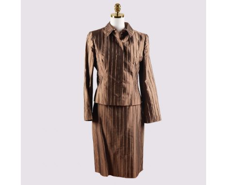 Expertly crafted from luxurious bronze silk with a subtle sheen, this sophisticated 3-piece skirt suit by Valentino Roma incl