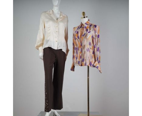 This sophisticated 3-piece Escada ensemble includes two silk blouses and one pair of embellished pants. The first blouse is a