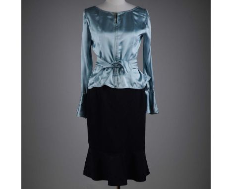 This elegant Yves Saint Laurent Rive Gauche ensemble features a lustrous pale blue silk top with a structured silhouette, pep