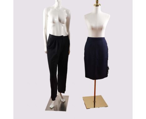 A sophisticated duo from Valentino Boutique, this vintage Italian-made skirt and trouser set blends timeless elegance with re