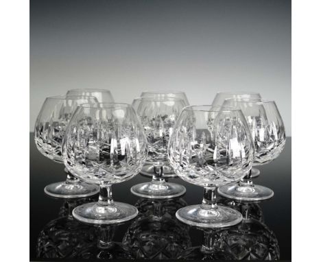 These eight Waterford Crystal Mourne brandy glasses feature an iconic acid-etched diamond and wedge pattern that scatters lig
