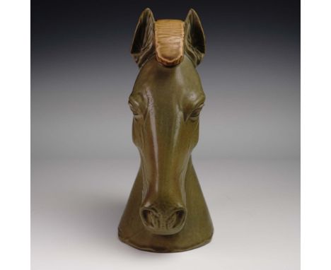 This striking porcelain horse head by Lladro showcases the sculptural talent of Salvador Furio, issued in 1970. Originally pa