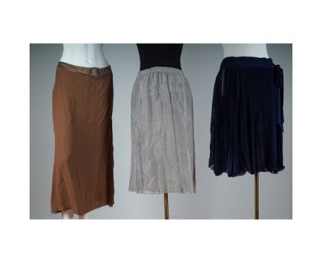 A refined trio of Valentino Boutique skirts, showcasing the elegance and craftsmanship of the iconic Italian fashion house. T
