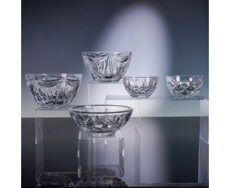 This elegant 5-piece set of Waterford crystal features two open sugar bowls, one small party bowl, and two classic cut crysta