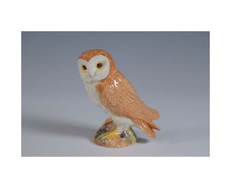 Charming Beswick porcelain figurine of a barn owl, meticulously hand-painted in naturalistic hues of brown, white, and yellow
