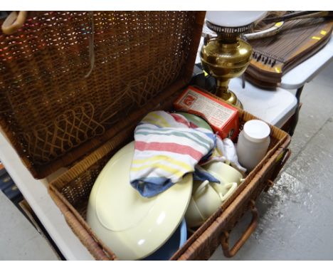 Vintage wicker picnic basket and contents