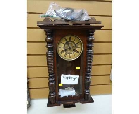 A vintage mahogany cased Vienna-style wall clock
