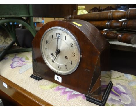 An Art Deco-style inlaid mantel clock