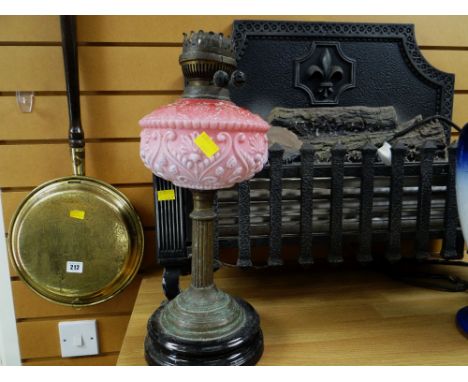 Parcel of items to include pink glass based oil lamp, brass effect warming pan and a vintage log effect electric fire  Condit