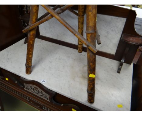 A vintage mahogany inlaid marble topped and backed wash stand