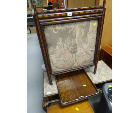 A vintage embroidered fire screen together with an oak carry handled serving tray