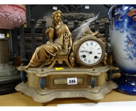 A gilt metal & marble mantel clock with a Roman noble lady seated next to circular clock face, retailed by J W Benson, Ludgat