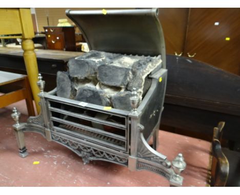 A vintage ornate coal effect electric fire