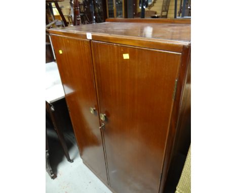 A vintage compact wardrobe