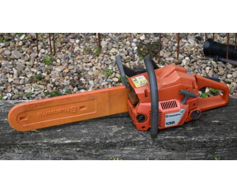 A used Husqvarna 136 chainsaw, as seen 