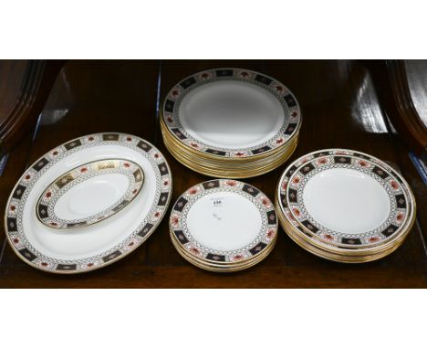 A part set of Royal Crown Derby 'Derby China' pattern dinner-ware, comprising nine 27 cm plates, five 23 cm soup plates, five