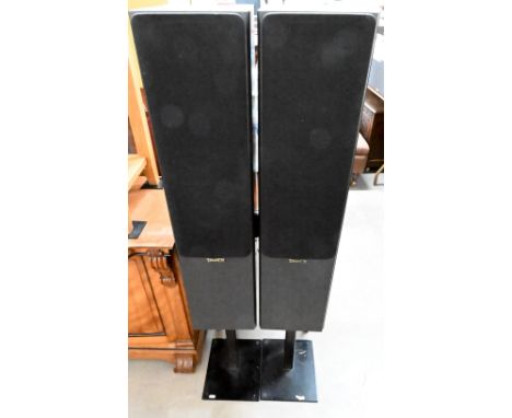 A pair of Tannoy Merary M3 80w hifi pillar speakers on stands, 132 cm high 