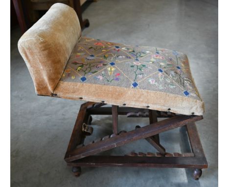 A Victorian oak adjustable gout stool with tapestry upholstery 