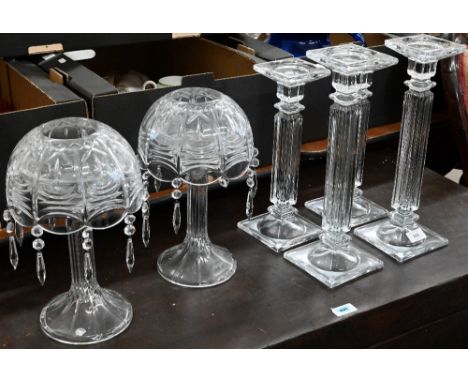 Two large pairs of glass pillar candlesticks and a pair of candle-lamps hung with lustre drops (6) 