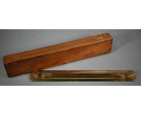 A vintage brass rolling ruler by UWW, Birmingham, 46 cm in stained pine case