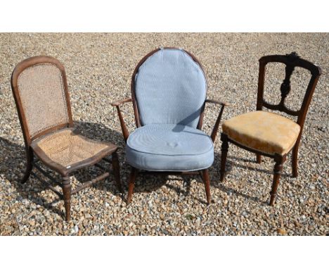 A vintage Ercol style dining chair to/w a single dining chair and a caned seat chair (3) 