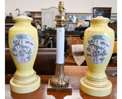 A gilt metal table lamp with opaque glass pillar top, 51 cm high to/w two yellow-glazed pottery table lamp bases (3) 