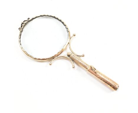 A 19th century Victorian 9ct gold and opal magnifying glass. Marked for Charlotte, London. 1873.&nbsp; Weight 45.9g. Measures
