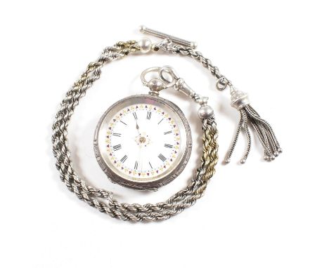 A French silver 935 fob pocket watch. Key wind with gilded decorated enamel dial, Roman numeral chapter ring. The vase with s