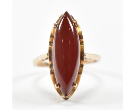 A hallmarked 9ct gold and carnelian cabochon ring. Weight 3.3g. Size K.5.
&nbsp;All weights, measurements and sizes are appro