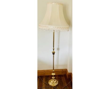 A 20th century brass floor standing lamp. 172cm H