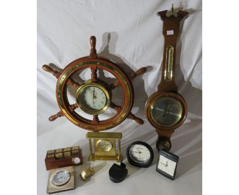 Collection of clocks and a barometer.